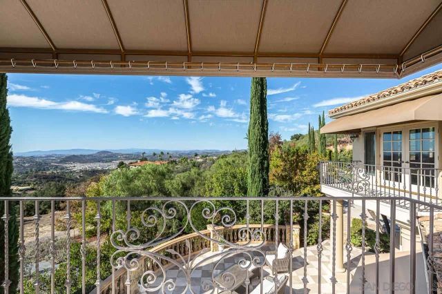a front view of house with yard and outdoor seating