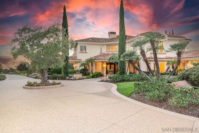 a view of a swimming pool with a lounge chair