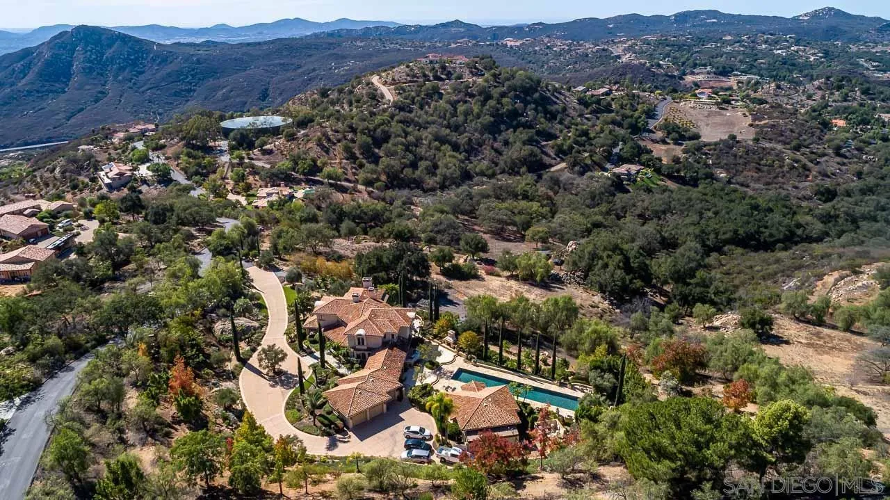 14440 Ridge Ranch Road Valley Center, CA 92082 - Photo 69 of 74 an aerial view of residential house and car parked