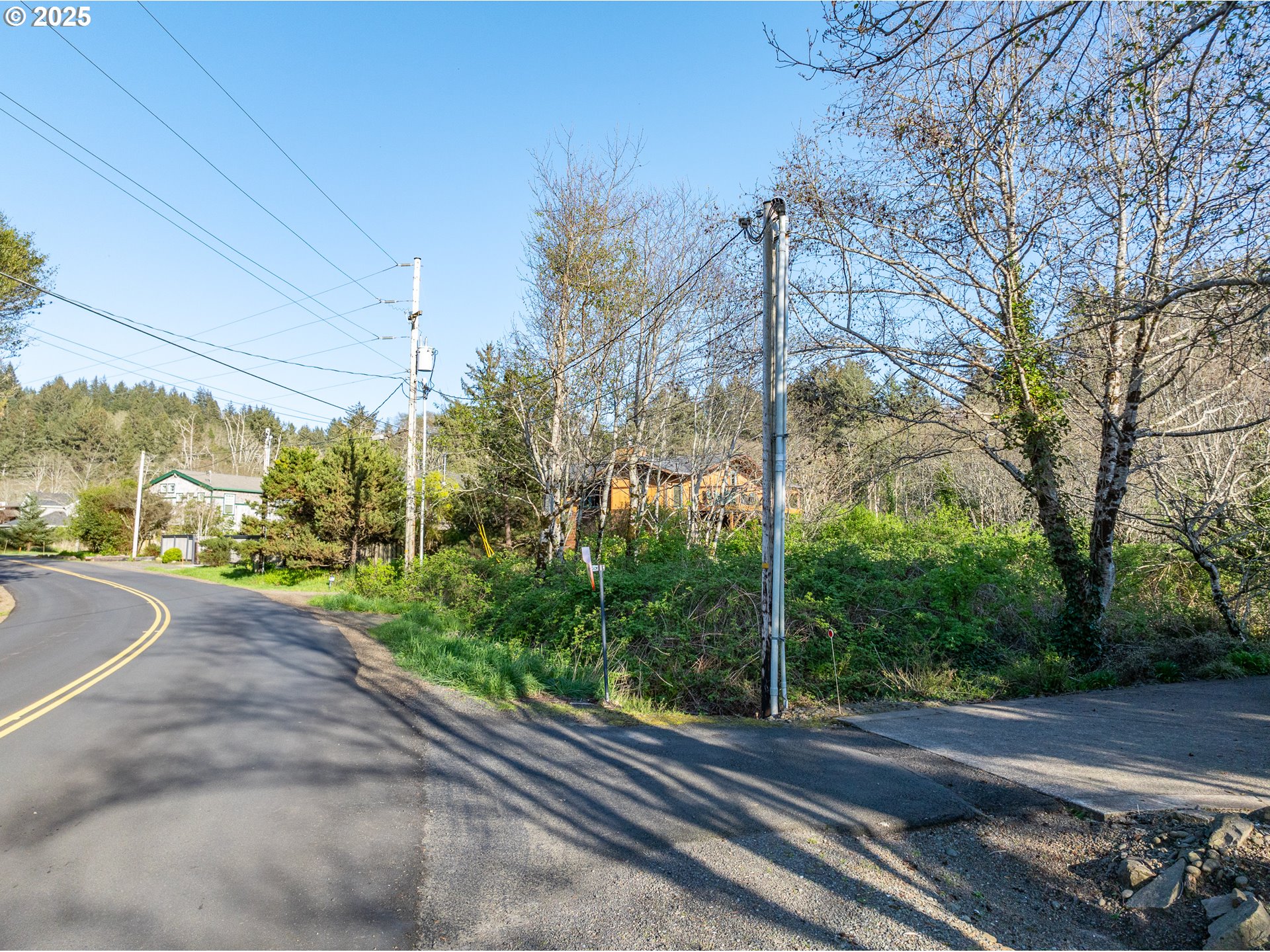 Nehalem Road Manzanita, OR 97130 - Photo 4 of 16 a view of a road with a building in the background