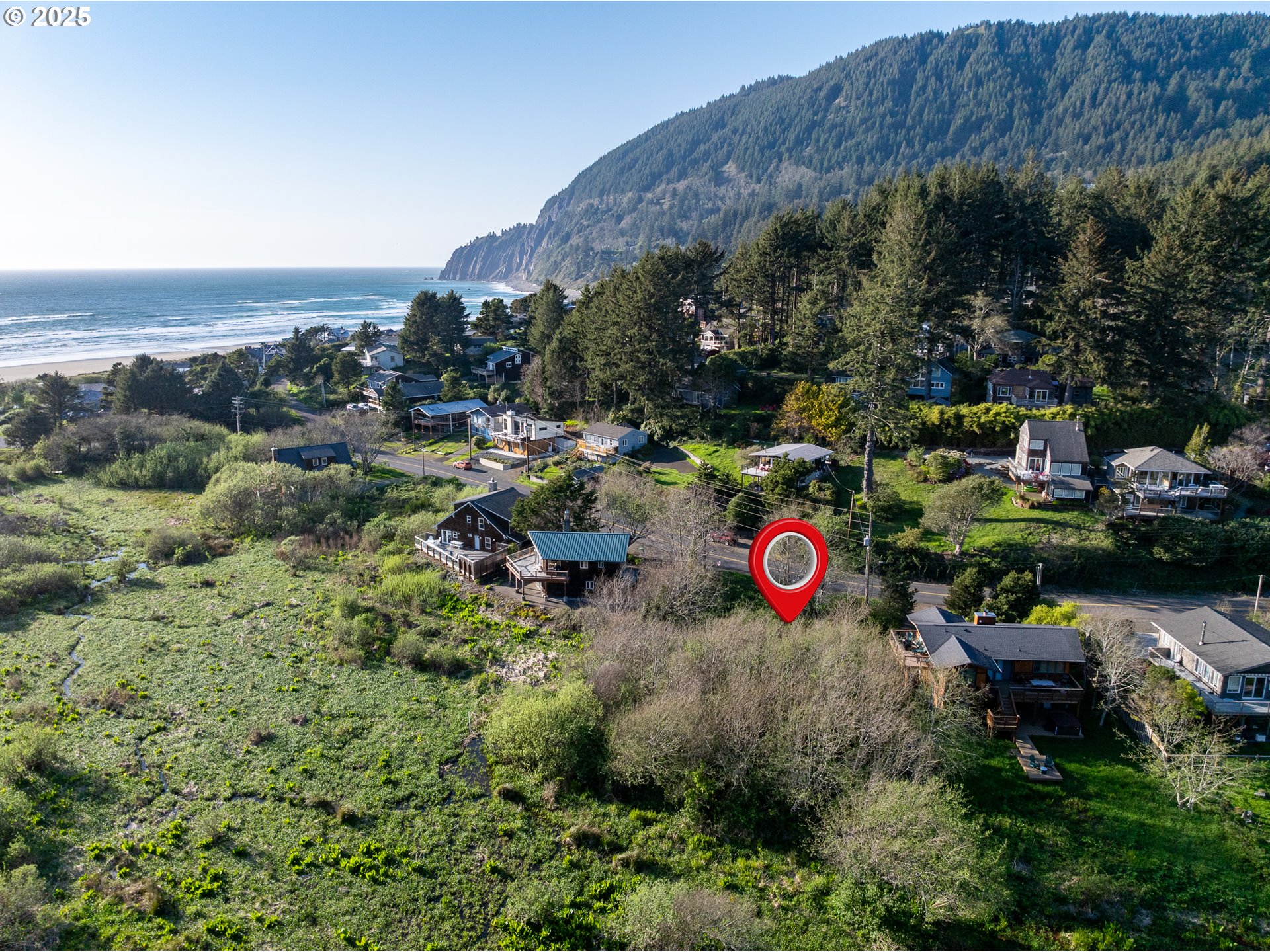 Nehalem Road Manzanita, OR 97130 - Photo 10 of 16 an aerial view of a houses with outdoor space