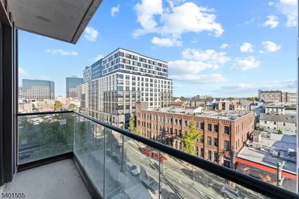 a view of a balcony with city view