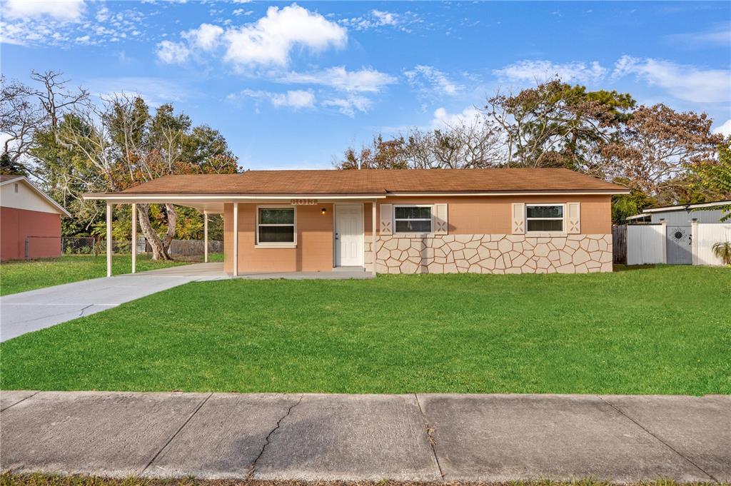 front view of house with a yard
