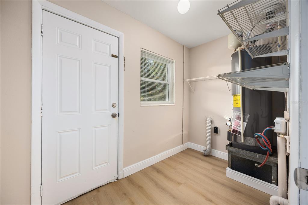 8013 Rhea Circle Orlando, FL 32807 - Photo 26 of 31 a view of a livingroom with furniture and a window