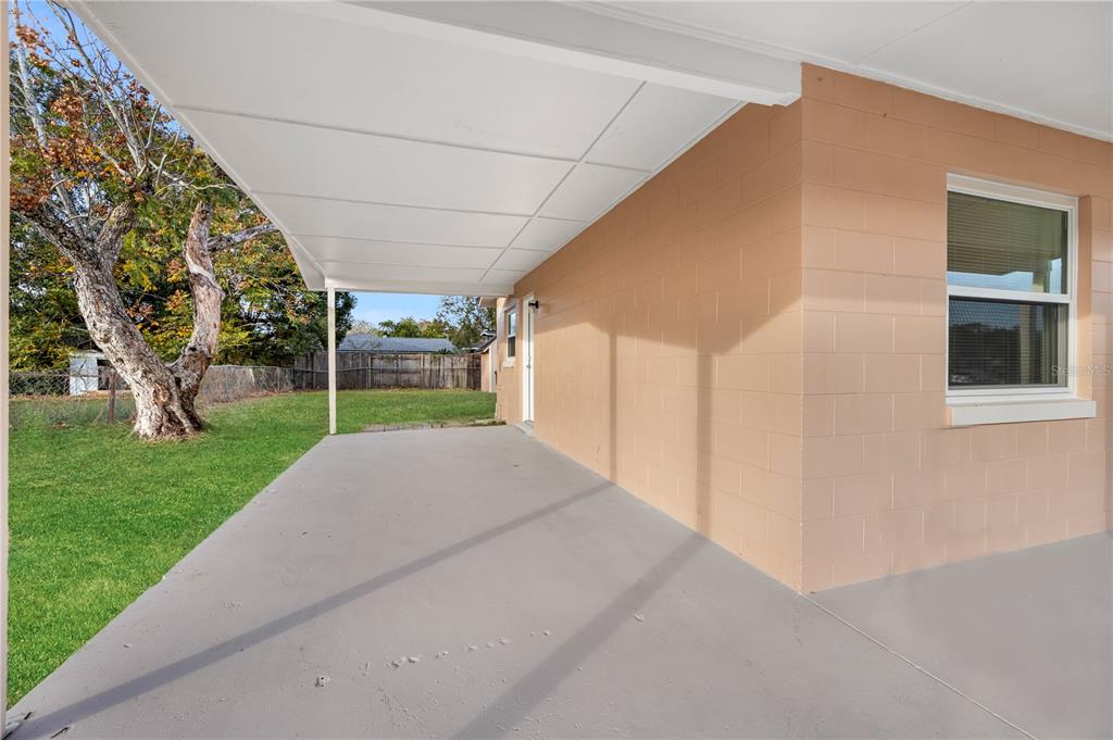 8013 Rhea Circle Orlando, FL 32807 - Photo 27 of 31 a view of a backyard of the house