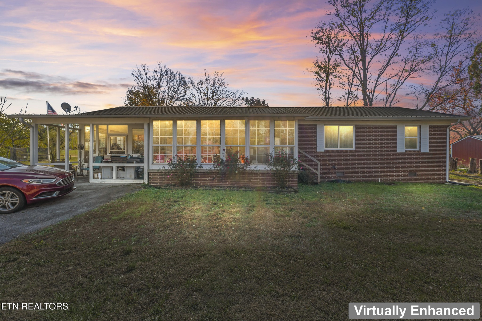 3856 Niles Ferry Road Greenback, TN 37742 - Photo 11 of 44 a view of a house with a backyard