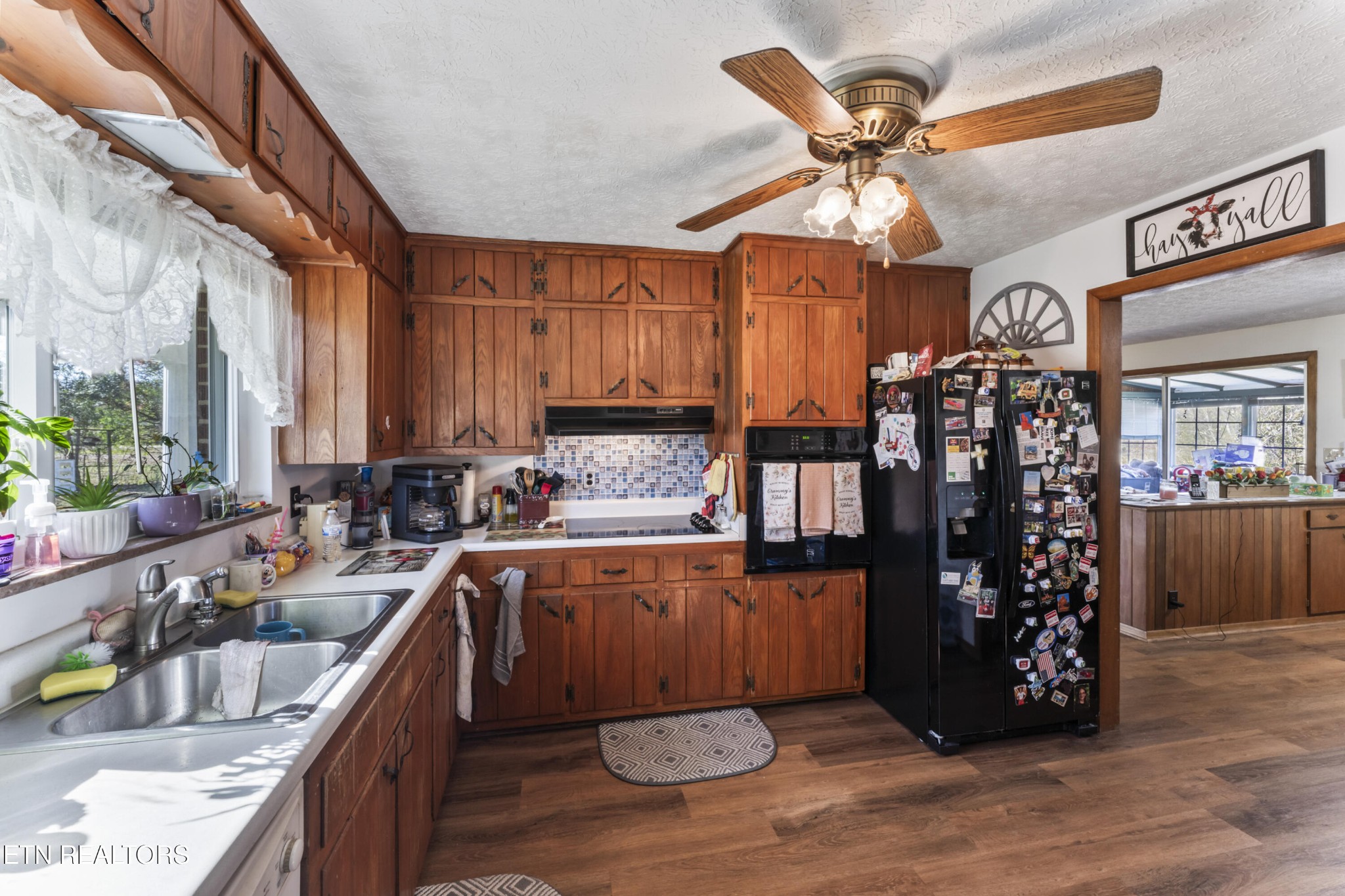 3856 Niles Ferry Road Greenback, TN 37742 - Photo 19 of 44 a kitchen with a sink cabinets and window