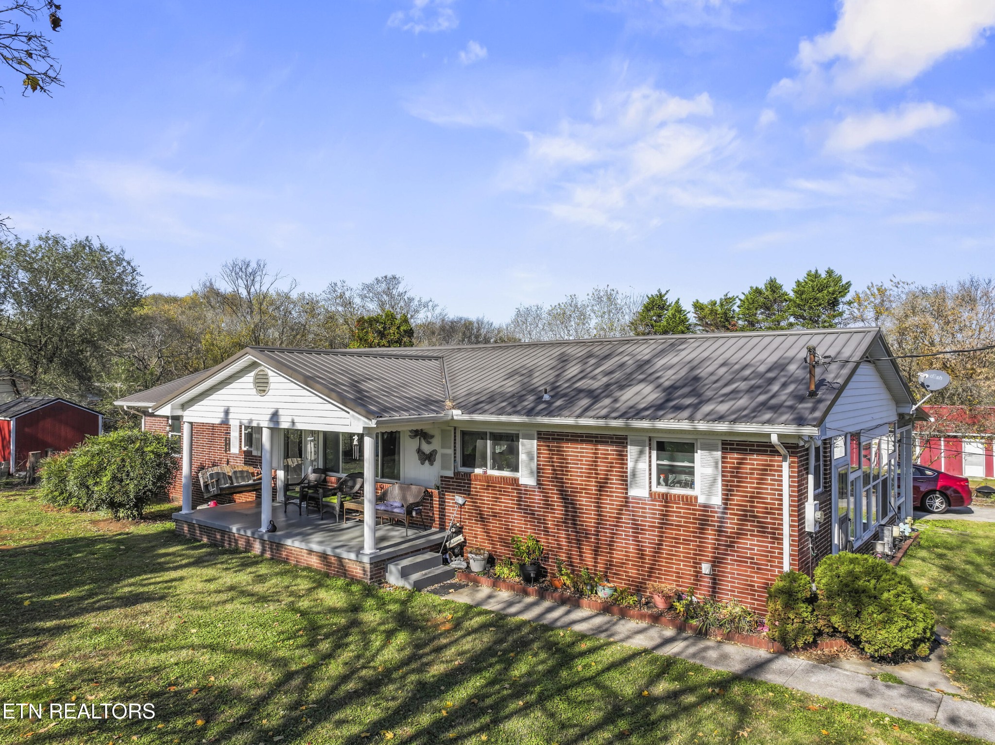 3856 Niles Ferry Road Greenback, TN 37742 - Photo 2 of 44 a view of house with outdoor space and sitting area