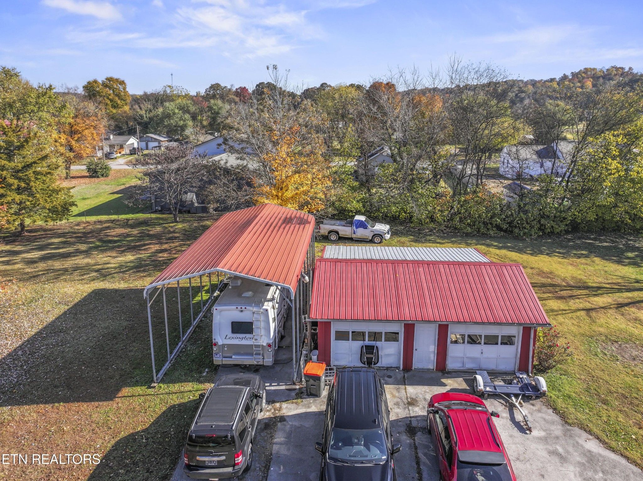 3856 Niles Ferry Road Greenback, TN 37742 - Photo 24 of 44 a view of a house with a patio