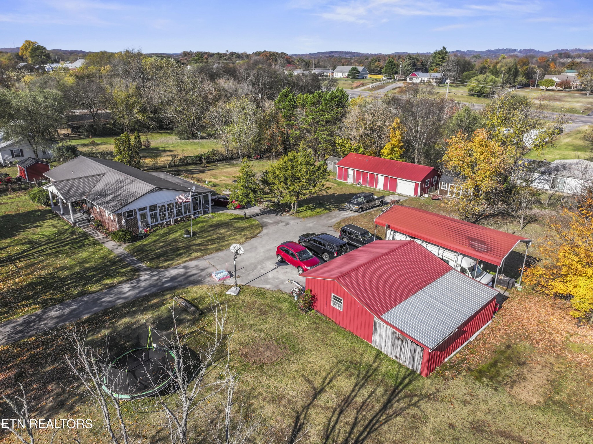 3856 Niles Ferry Road Greenback, TN 37742 - Photo 27 of 44 an aerial view of a red and white house