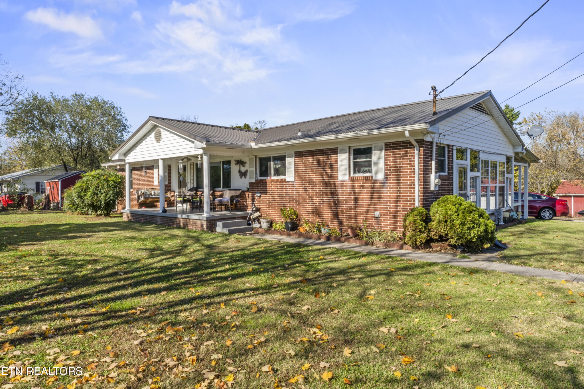 3856 Niles Ferry Road Greenback, TN 37742 - Photo 3 of 44 a view of a house with a big yard and potted plants