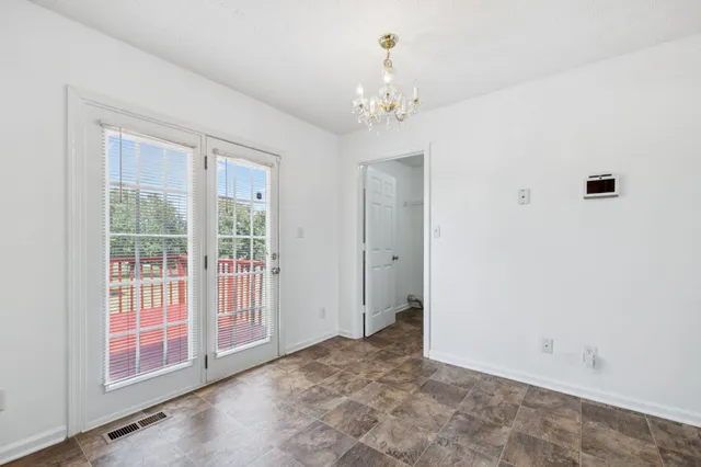 a view of a livingroom with a chandelier