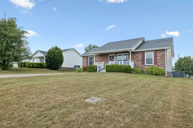 a house view with a garden space