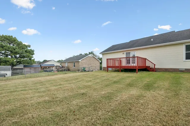 a view of a house with a big yard