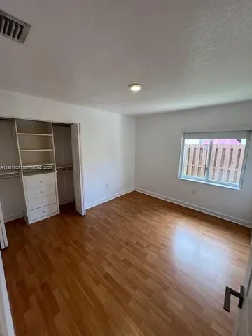 a bathroom with a double vanity sink mirror and double