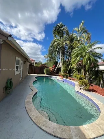 a vase of flowers sitting on a table