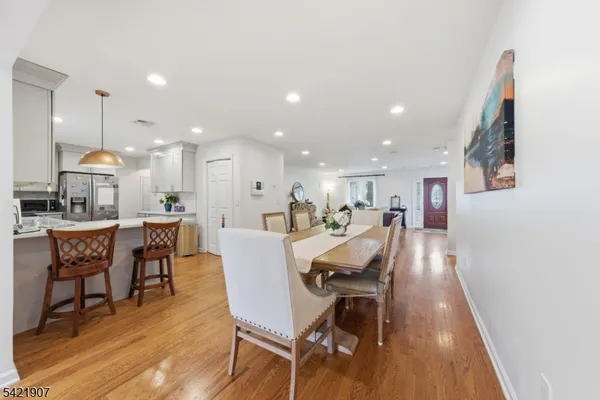 a kitchen with a sink stainless steel appliances and cabinets