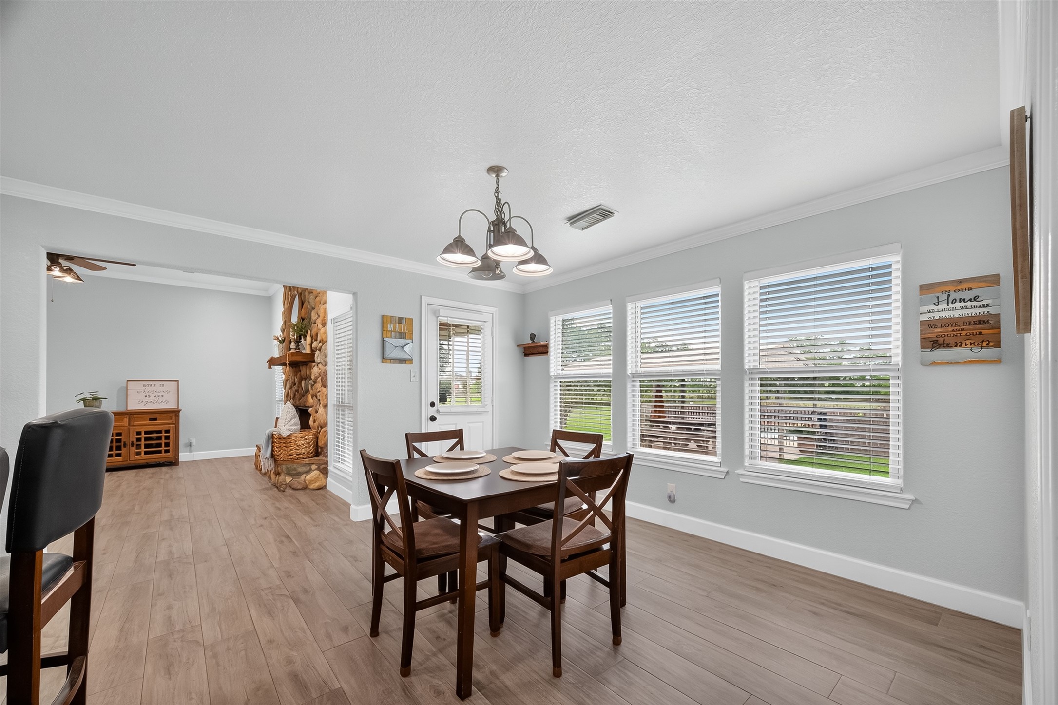1030 Ginger Street Santa Fe, TX 77517 - Photo 13 of 50 a view of a dining room with furniture window and wooden floor