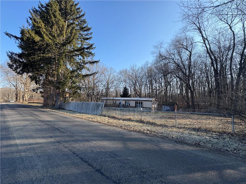 367 Studebaker Road Slippery Rock, PA 16057 - Photo 8 of 14 a view of a yard with trees