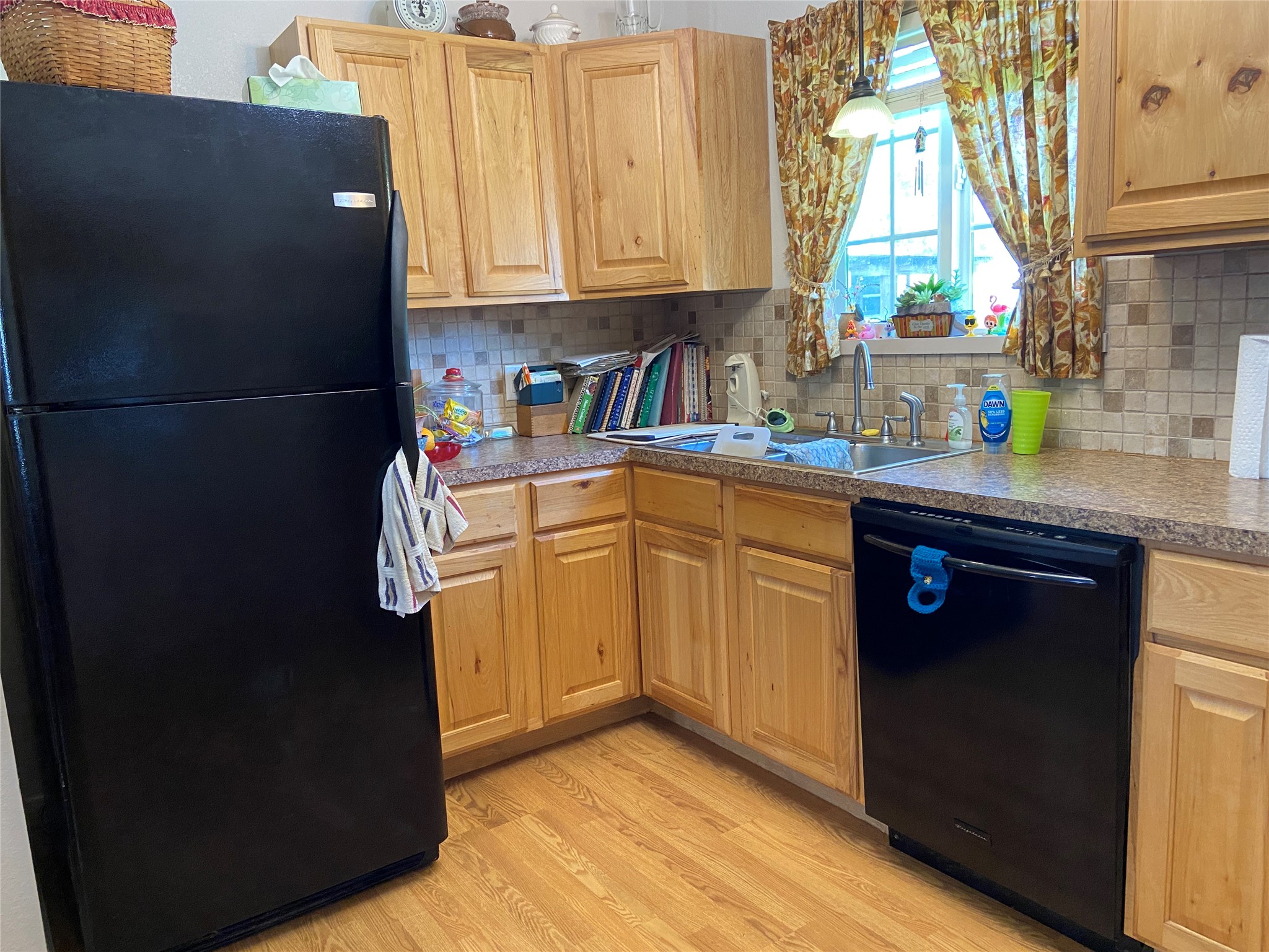 181 Hawk Livingston, TX 77399 - Photo 12 of 26 a kitchen with stainless steel appliances granite countertop a refrigerator a sink a stove and dishwasher