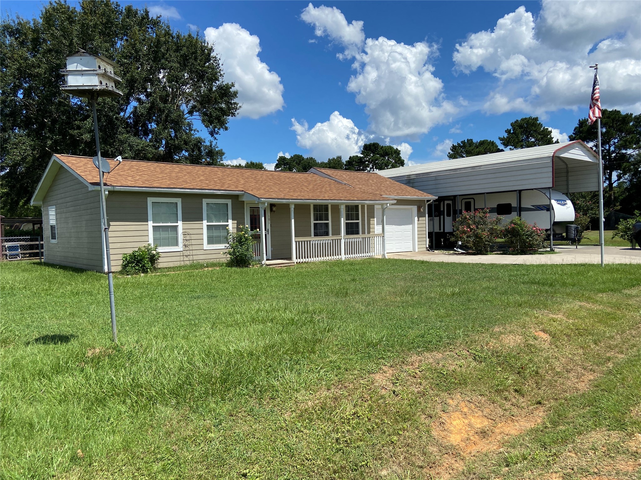 181 Hawk Livingston, TX 77399 - Photo 2 of 26 a view of a house with a backyard