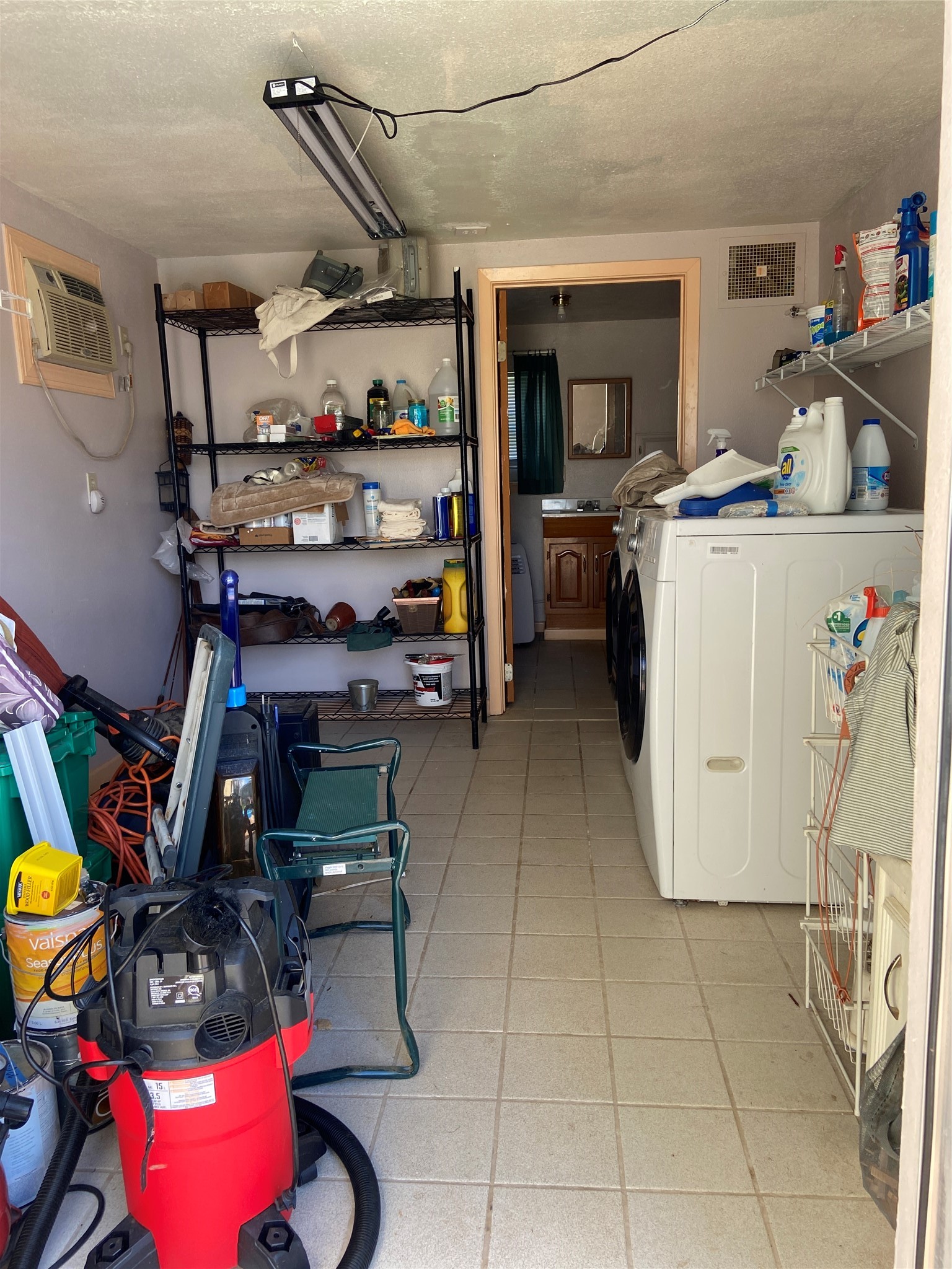 181 Hawk Livingston, TX 77399 - Photo 22 of 26 a room with storage and utility