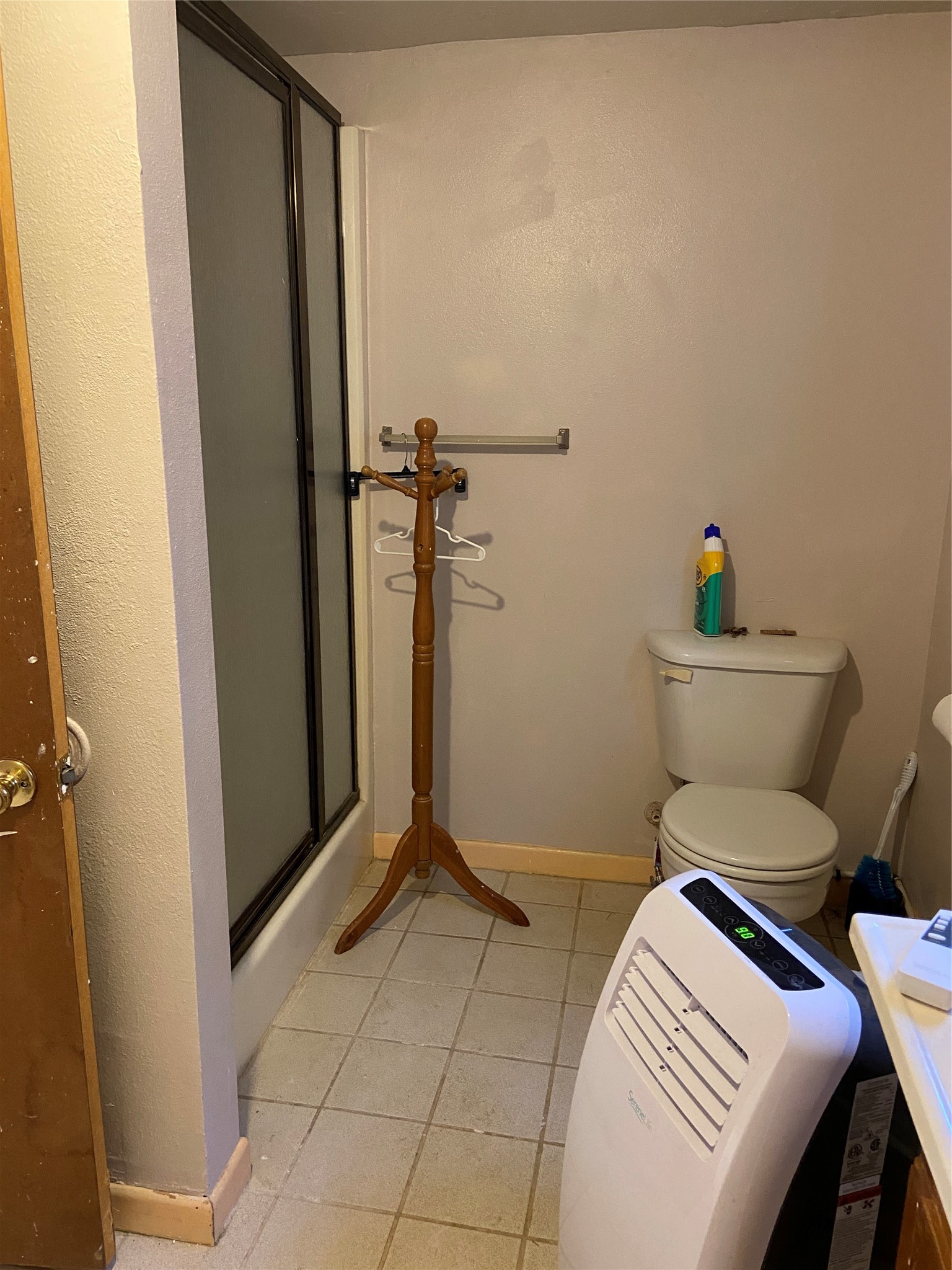 181 Hawk Livingston, TX 77399 - Photo 24 of 26 a bathroom with a toilet and a shower