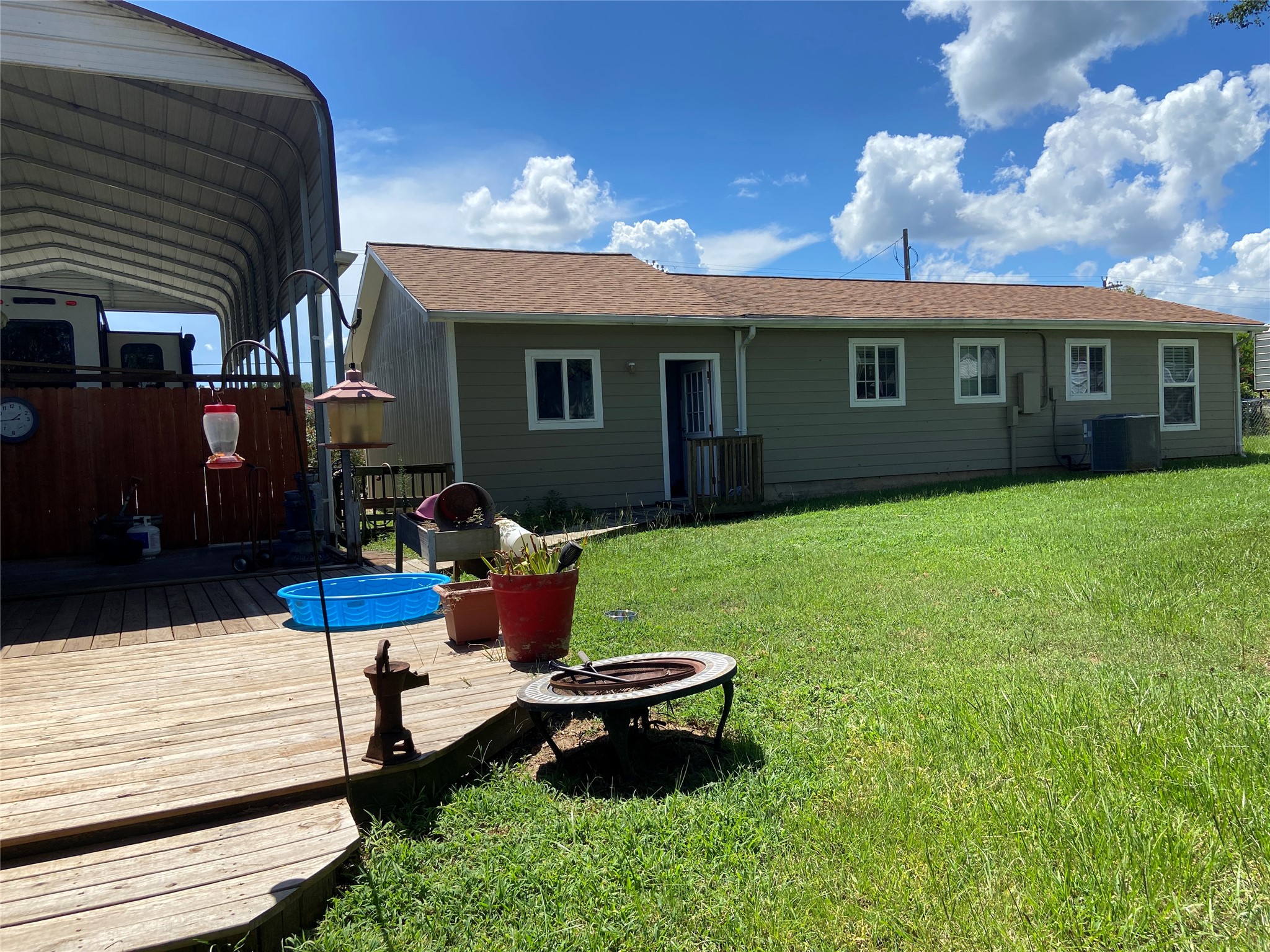 181 Hawk Livingston, TX 77399 - Photo 4 of 26 a backyard of a house with table and chairs