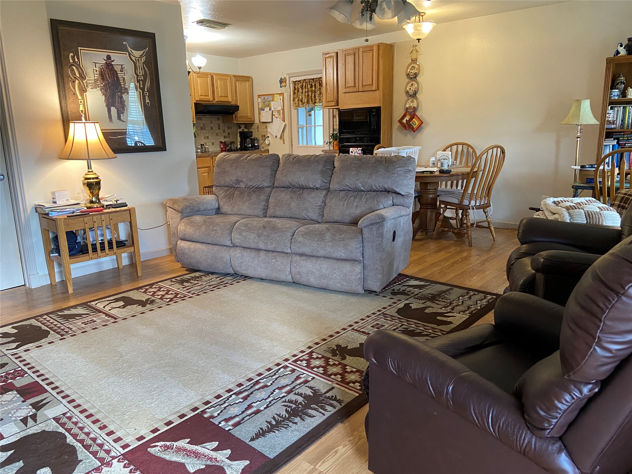 181 Hawk Livingston, TX 77399 - Photo 7 of 26 a living room with furniture and a fireplace