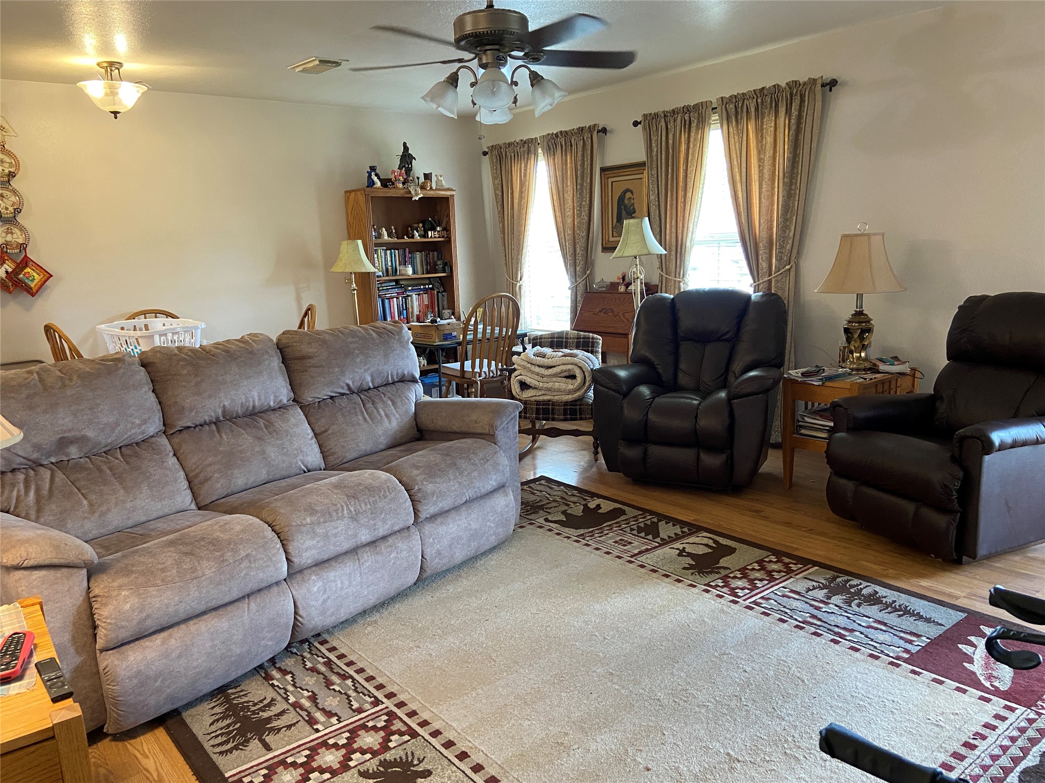 181 Hawk Livingston, TX 77399 - Photo 8 of 26 a living room with furniture and a large window