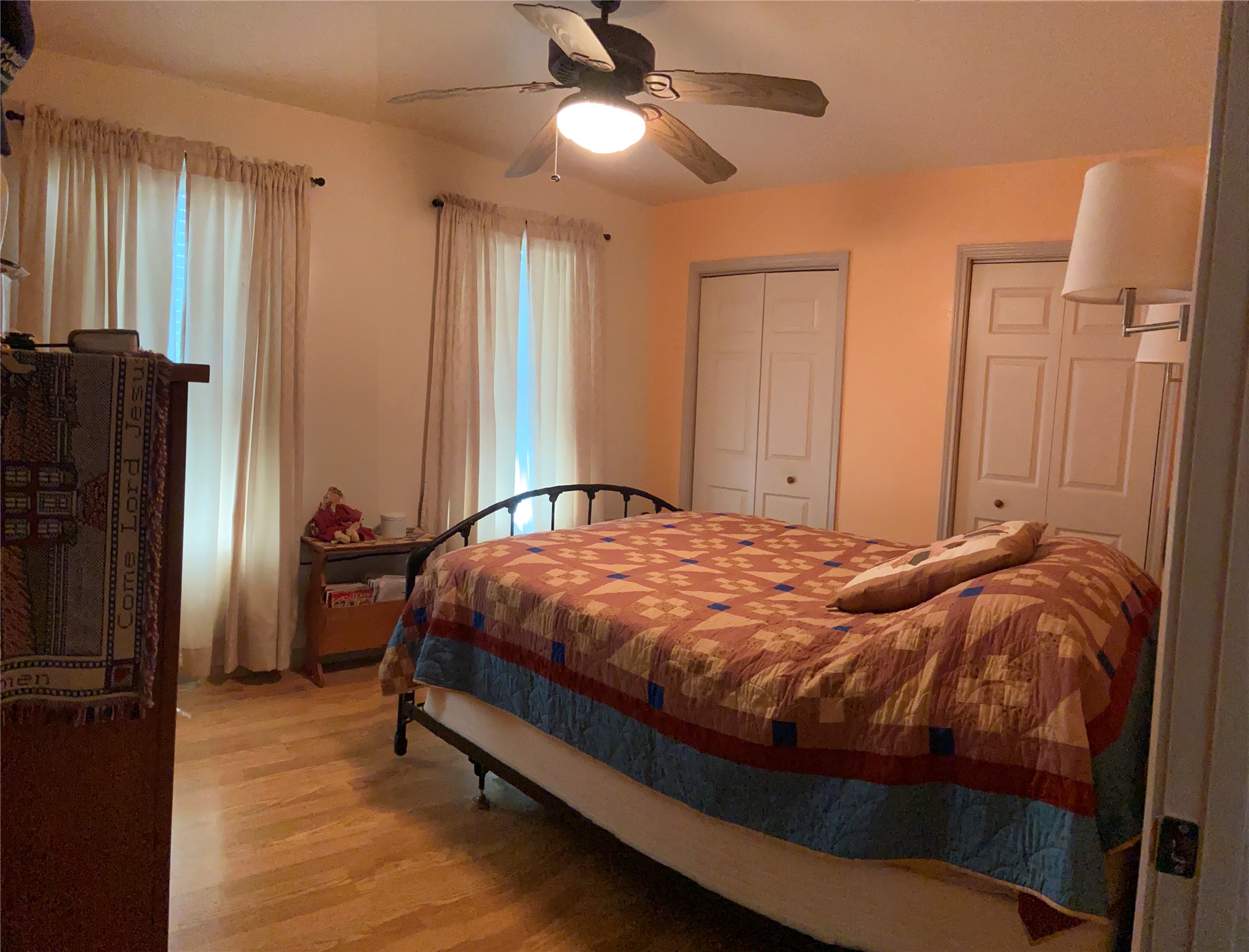 181 Hawk Livingston, TX 77399 - Photo 10 of 26 a bedroom with a bed dresser and a window