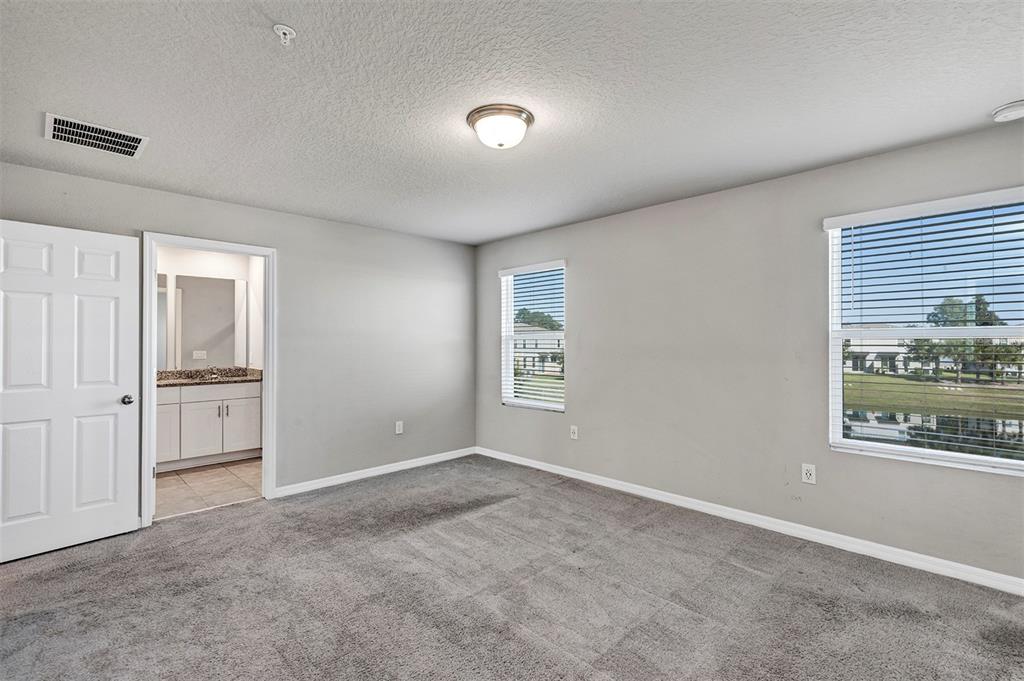 1073 Desert Candle Drive Ocoee, FL 34761 - Photo 30 of 55 a view of an empty room with a window