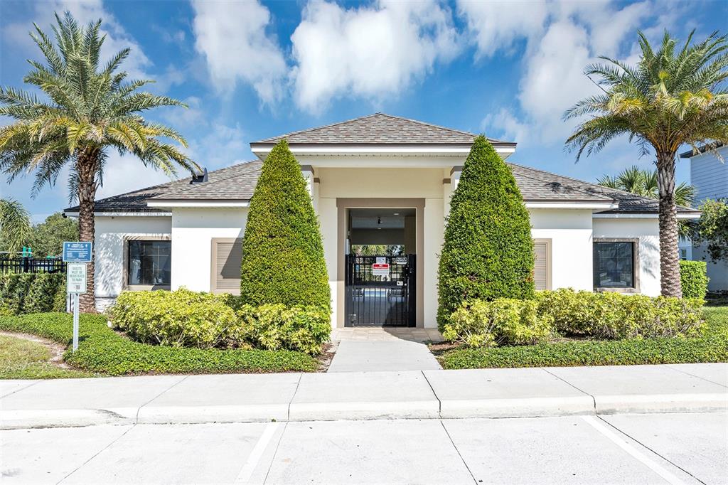 1073 Desert Candle Drive Ocoee, FL 34761 - Photo 38 of 55 a front view of a house with a garden