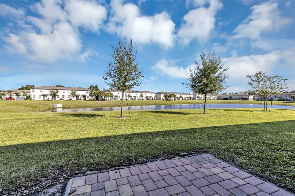 1073 Desert Candle Drive Ocoee, FL 34761 - Photo 4 of 55 a view of an ocean and houses