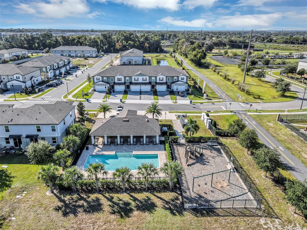 1073 Desert Candle Drive Ocoee, FL 34761 - Photo 45 of 55 an aerial view of a house with a garden