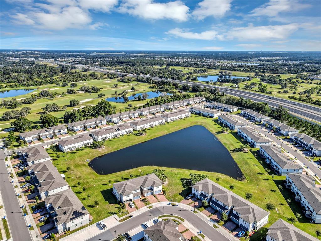 1073 Desert Candle Drive Ocoee, FL 34761 - Photo 50 of 55 an aerial view of residential houses with outdoor space