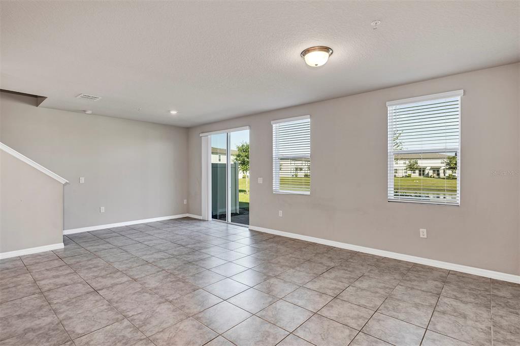 1073 Desert Candle Drive Ocoee, FL 34761 - Photo 8 of 55 an empty room with windows