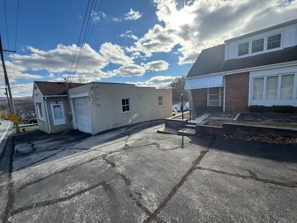 a view of a house with a patio