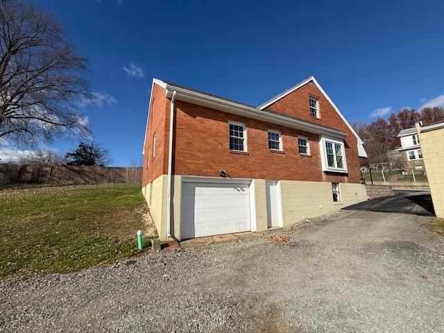 2122 Highway 130 Pleasant Unity, PA 15676 - Photo 11 of 16 a front view of a house with a yard