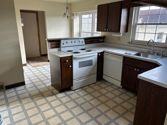 2122 Highway 130 Pleasant Unity, PA 15676 - Photo 6 of 16 a kitchen with a stove sink and cabinets