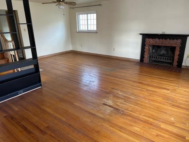 2122 Highway 130 Pleasant Unity, PA 15676 - Photo 6 of 16 a view of an empty room with wooden floor and a window