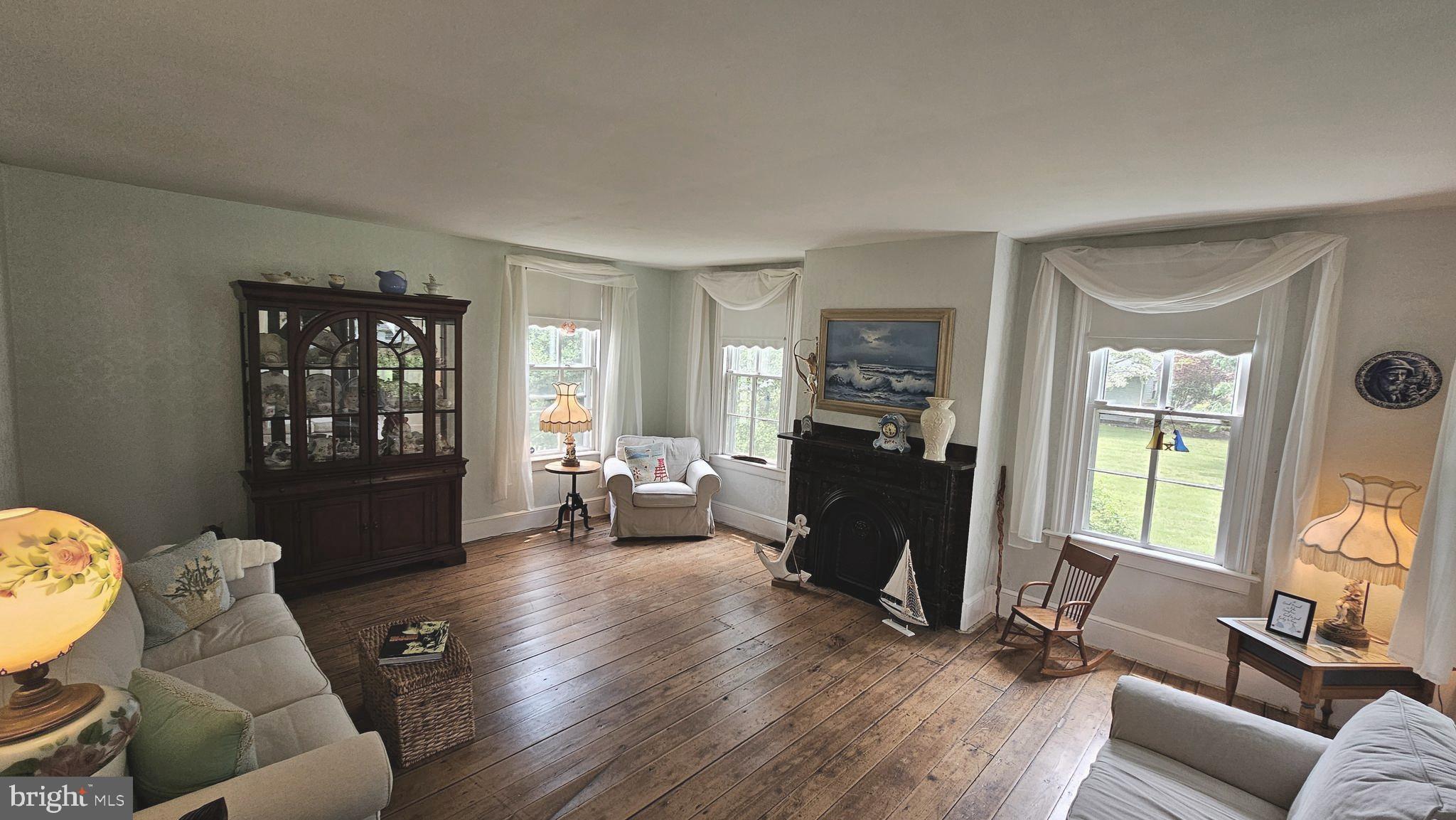 441 Dutch Neck Road East Windsor, NJ 08520 - Photo 11 of 51 a living room with furniture and a window