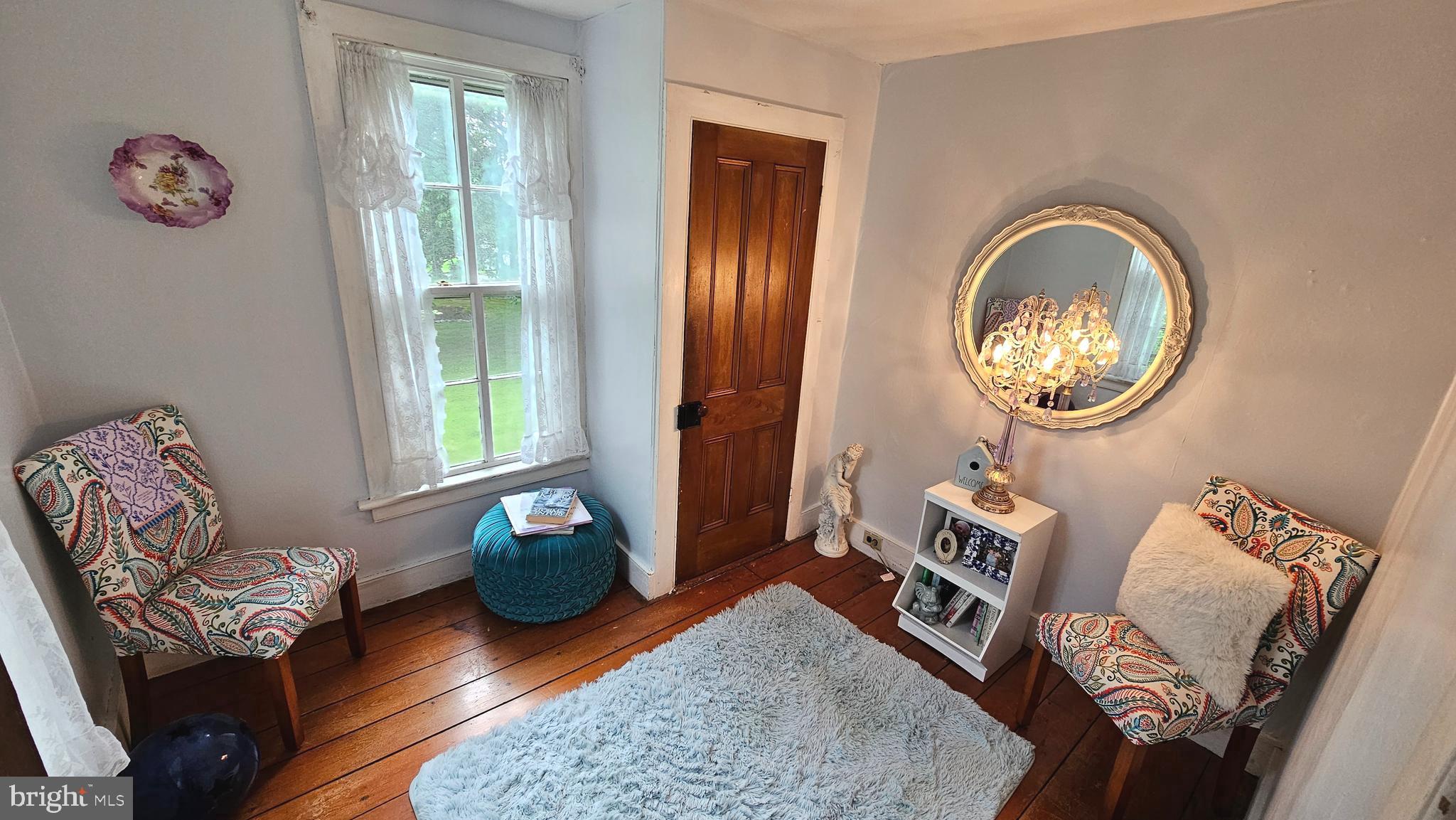 441 Dutch Neck Road East Windsor, NJ 08520 - Photo 31 of 51 a living room with furniture and a window