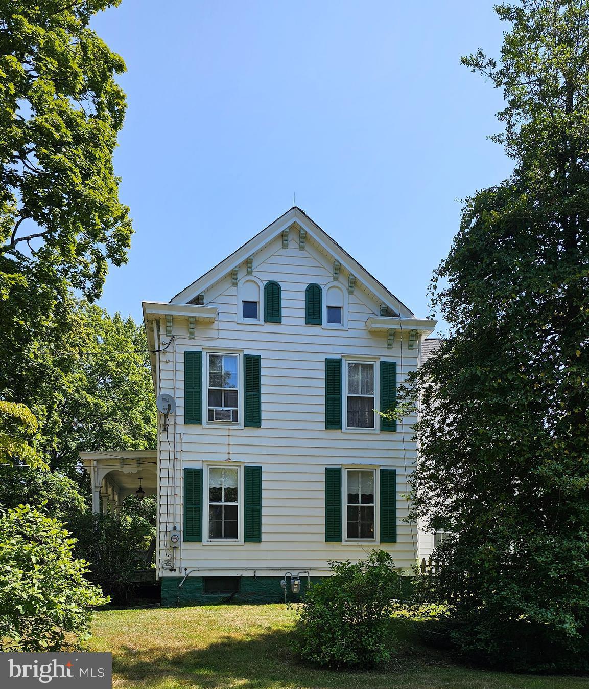 441 Dutch Neck Road East Windsor, NJ 08520 - Photo 4 of 51 a front view of a house with a garden