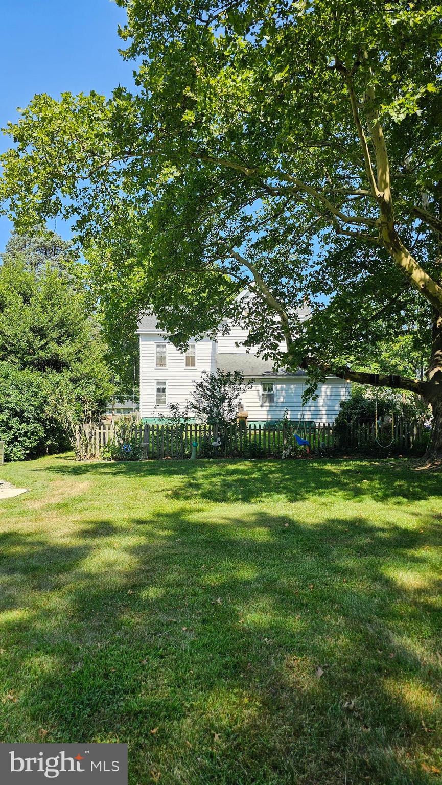 441 Dutch Neck Road East Windsor, NJ 08520 - Photo 50 of 51 a view of a grassy field with an trees