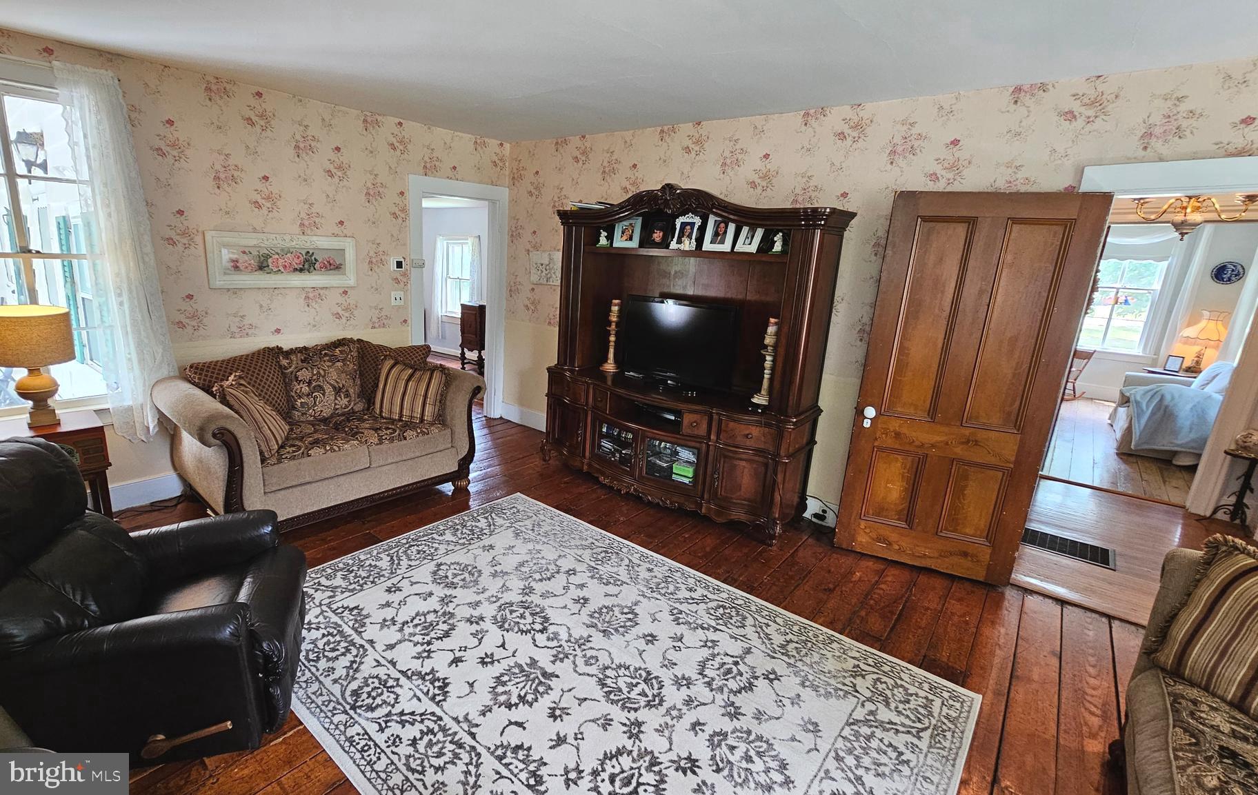 441 Dutch Neck Road East Windsor, NJ 08520 - Photo 6 of 51 a living room with furniture and a flat screen tv