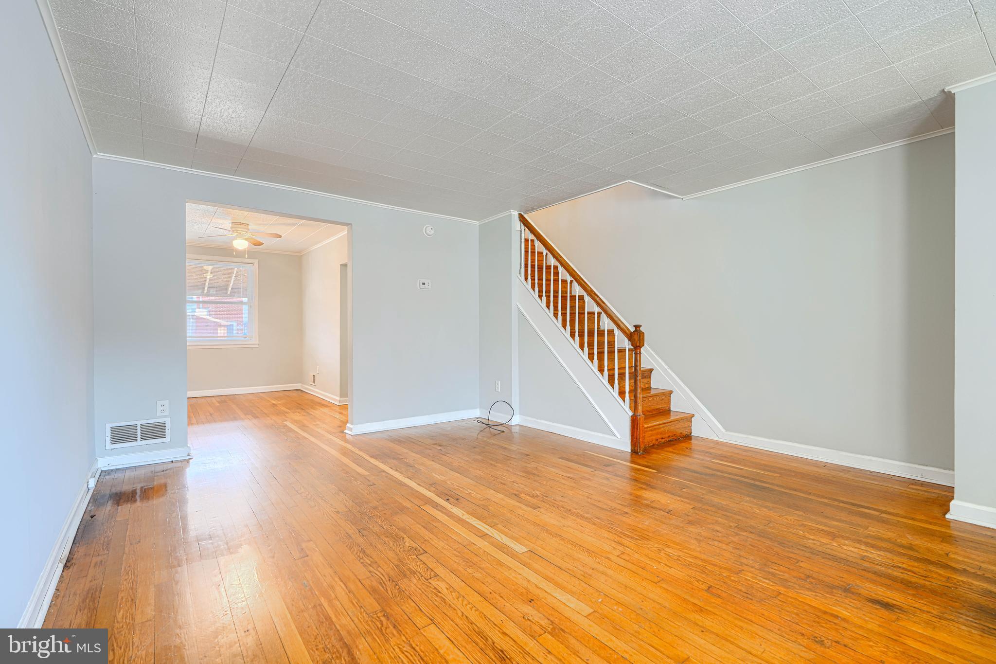 2073 Jasmine Road Baltimore, MD 21222 - Photo 3 of 29 a view of an empty room with wooden floor