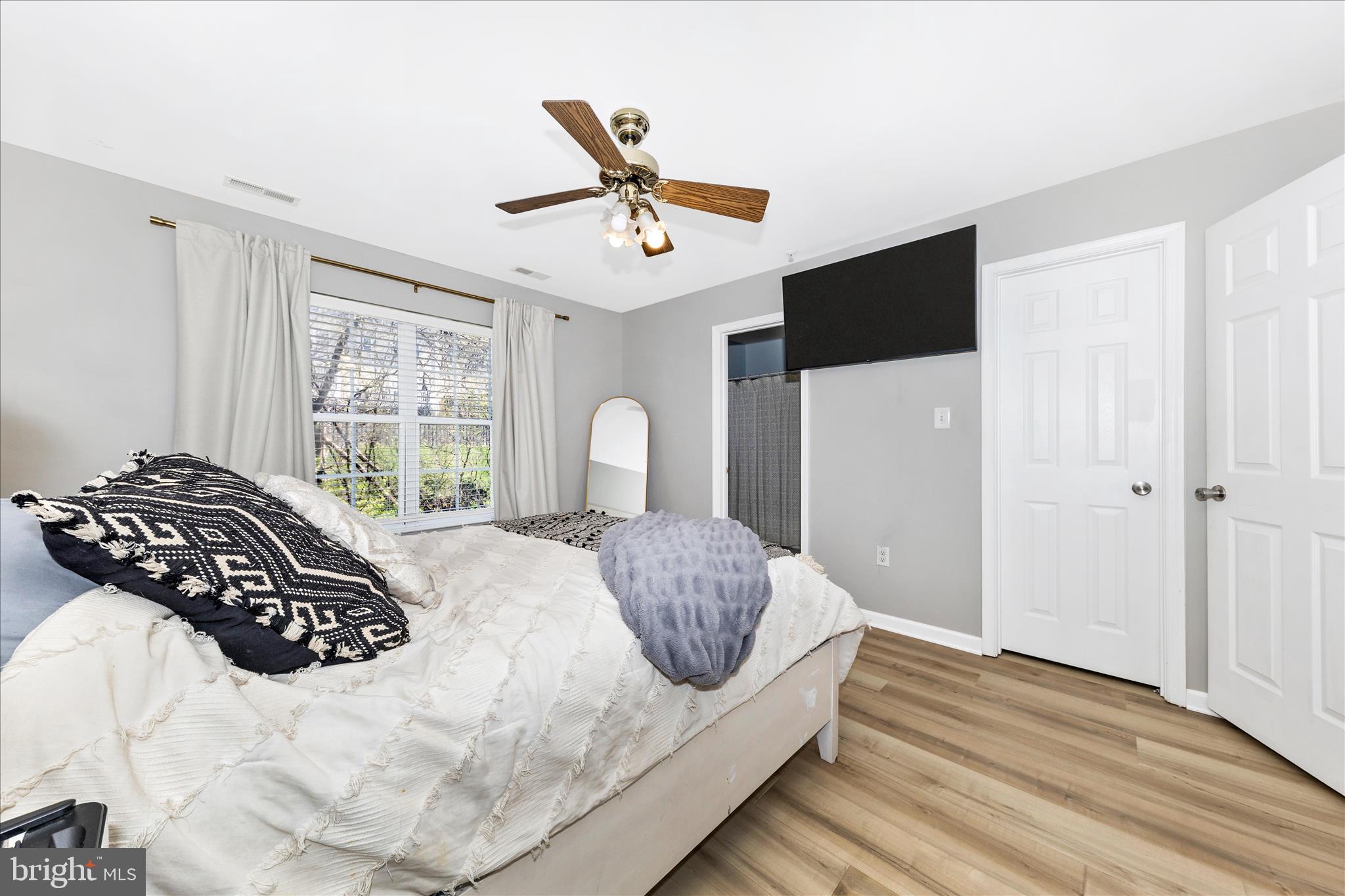 6107 Pine Ridge Terrace Frederick, MD 21701 - Photo 17 of 57 a bedroom with a bed and window