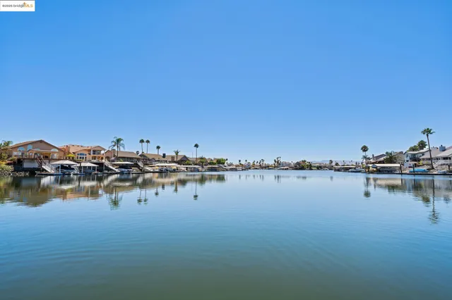 a view of a chairs and table on the wooden floor