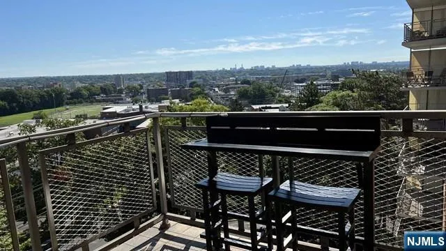 a balcony with a bench